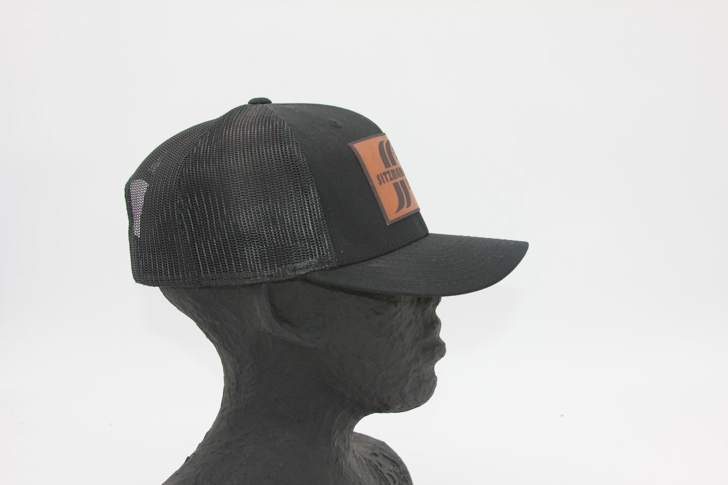 Black Mesh Snapback Sitzmark Trucker Hat