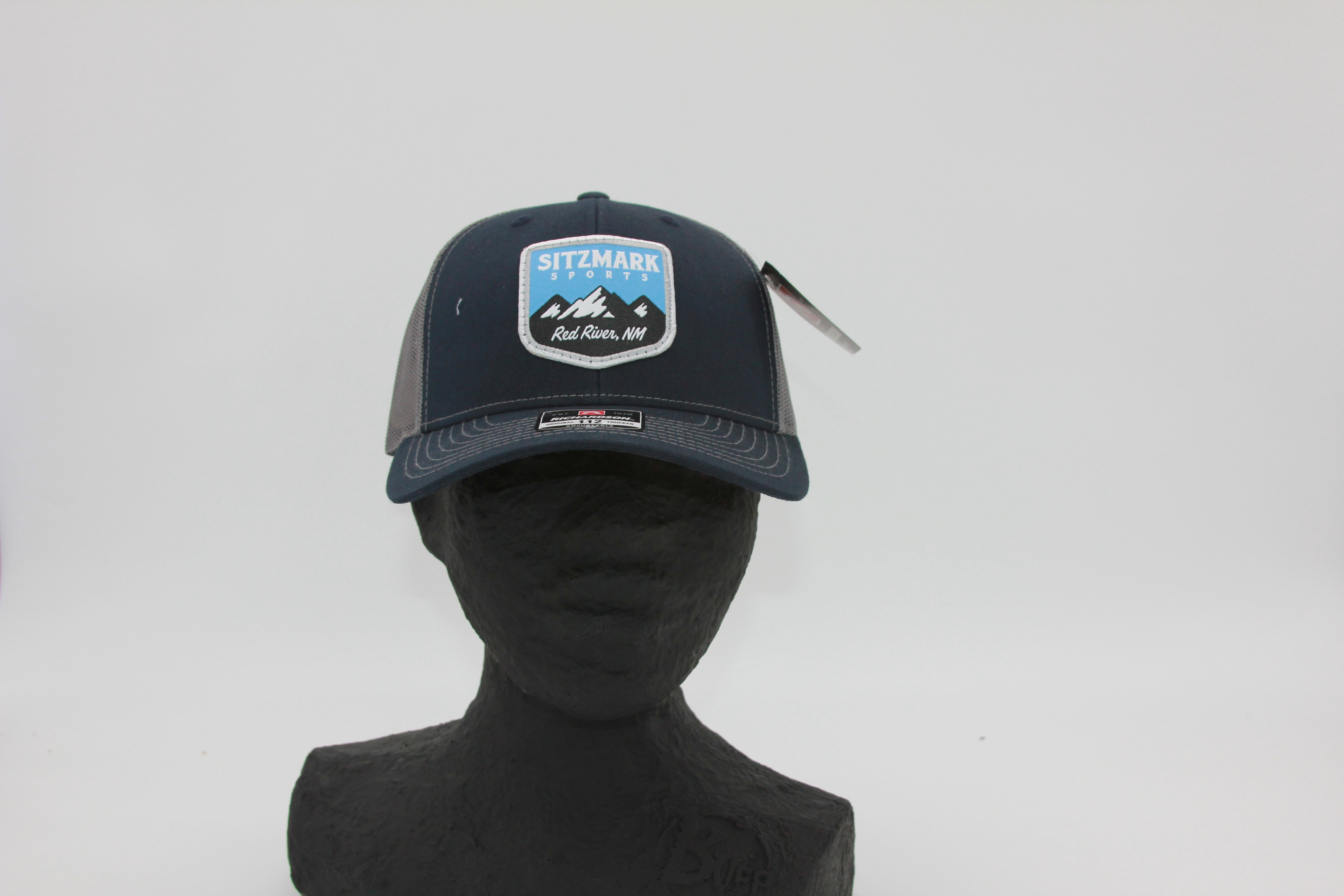 Blue and Dark Grey Mesh Sitzmark Trucker Hat – Sitzmark Sports and Lodge